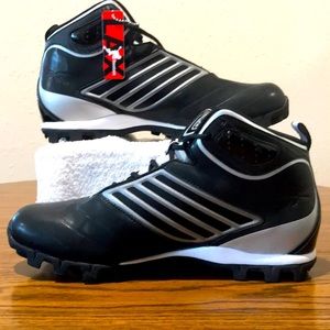 Black and white Reebok cleats.